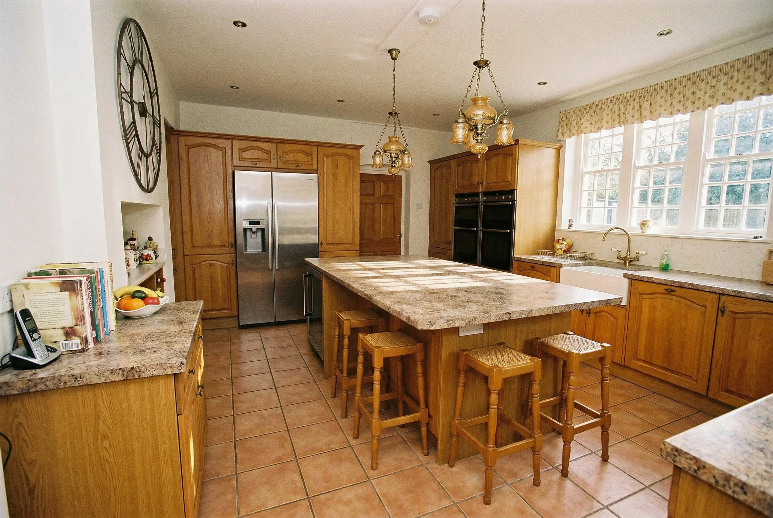 Firefly_Gemini Flash_Show this kitchen with the same layout, except make it look dated to around early 200 723458