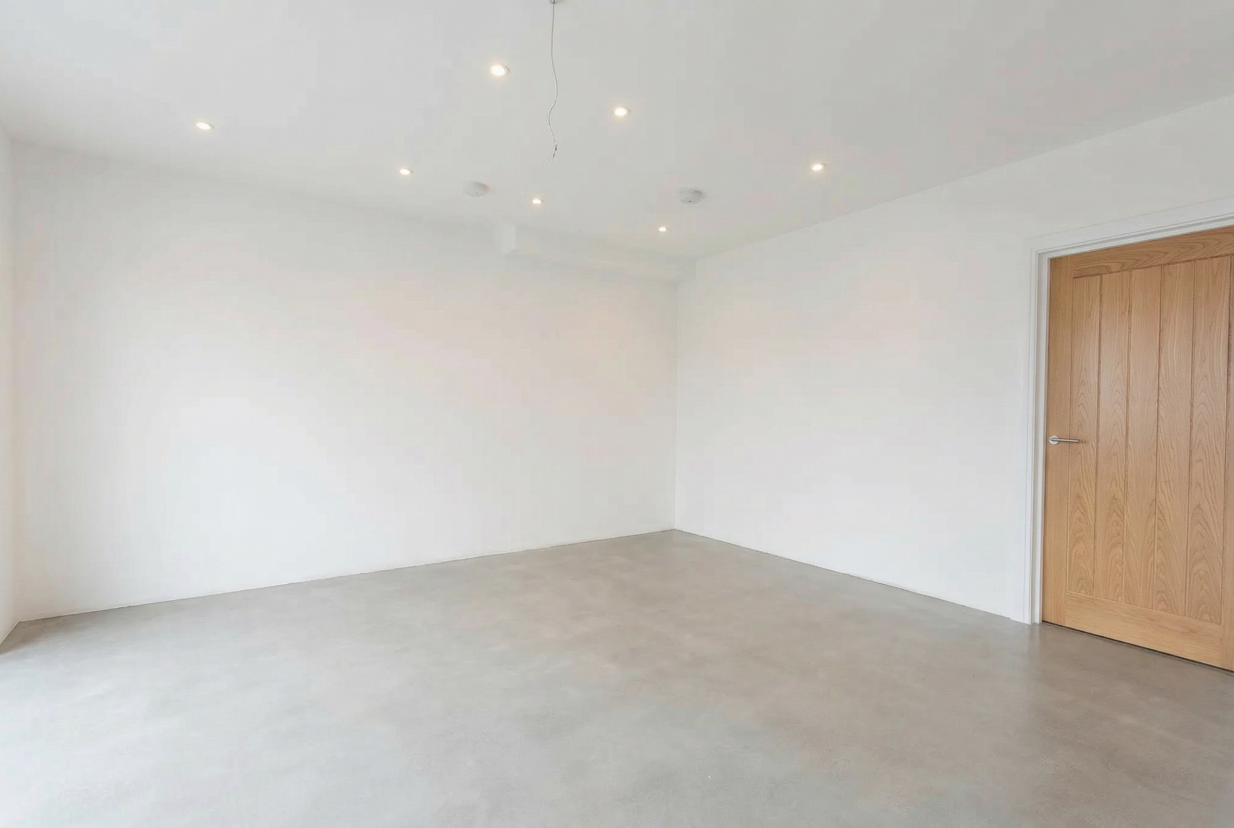 Firefly_Gemini Flash_Show this room as an entirely blank shell, no kitchen, no furniture, plain white wall 723458